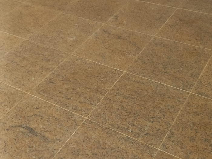 Calçada em granito amarelo